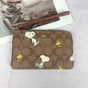 Coach X Peanuts Corner Zip Wristlet Wallet With Snoopy & Woodstock